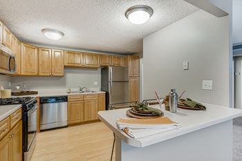 Eat-in kitchen with breakfast bar